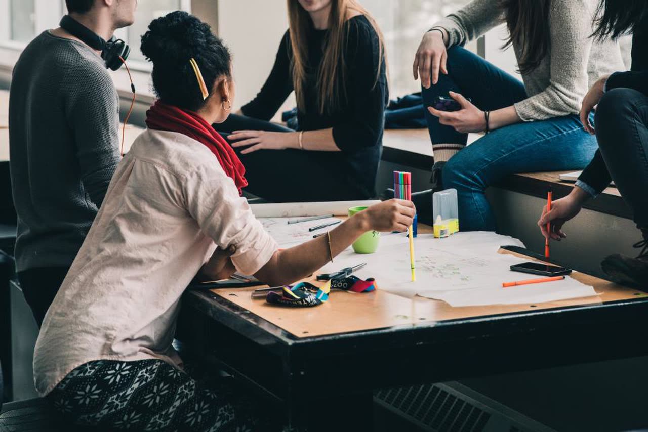 Students working together at a study table